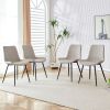 Light gray artificial leather backrest cushion dining chair, black metal legs, curved widened cushion design for more comfort